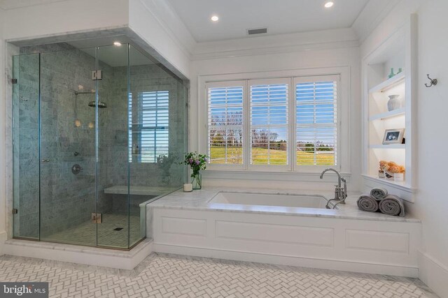 bathroom featuring a shower stall, a bath, and recessed lighting