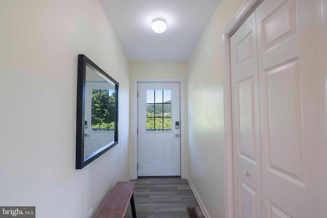 32 Old Hollow Rd, Sperryville, VA 22740 - doorway with visible vents, baseboards, and dark wood-style floors