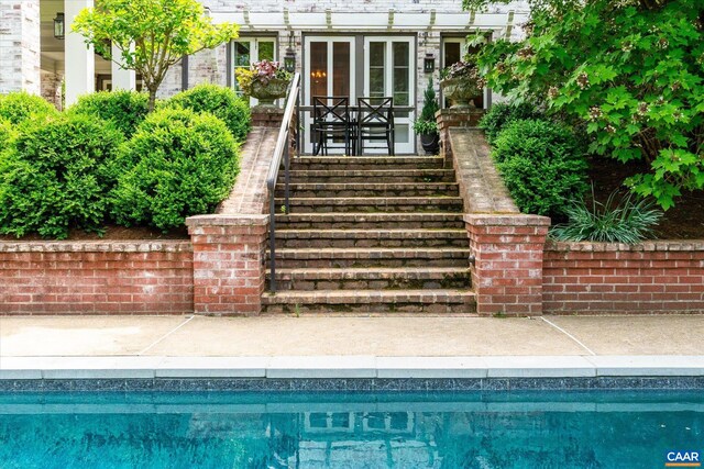 325 Farmington Dr, Charlottesville, VA 22901 - swimming pool with french doors