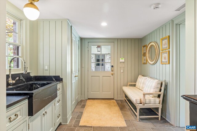 325 Farmington Dr, Charlottesville, VA 22901 - mudroom featuring a sink and stone tile floors