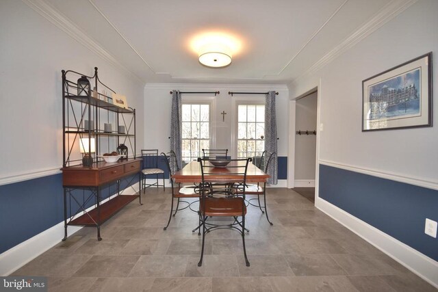  - dining room with crown molding and baseboards