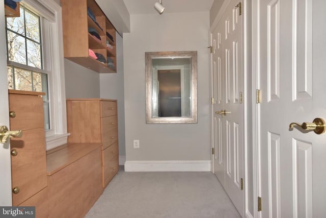  - corridor with carpet floors and baseboards