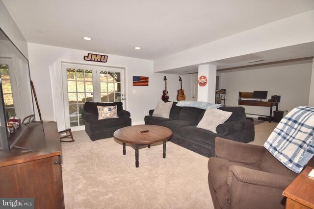  - carpeted living area with recessed lighting