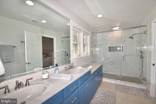  - full bathroom with a marble finish shower, tile patterned floors, double vanity, and recessed lighting