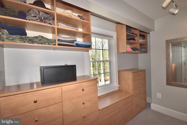  - detailed view of baseboards and track lighting