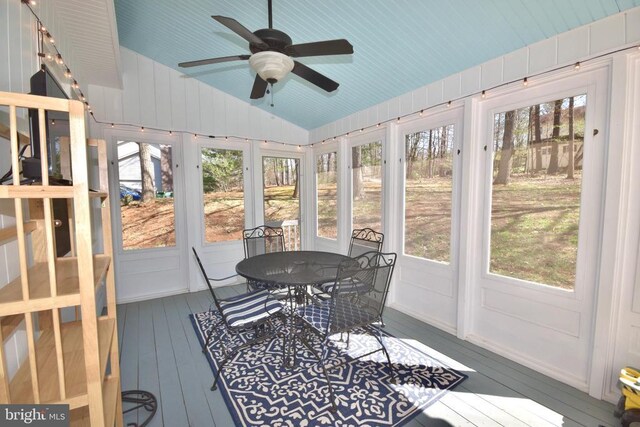  - sunroom featuring vaulted ceiling, a ceiling fan, and healthy amount of natural light
