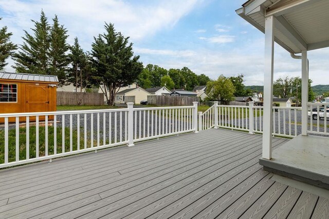 238 Charlotte Ave N, Waynesboro, VA 22980 - wooden deck with a fenced backyard, an outdoor structure, and a residential view