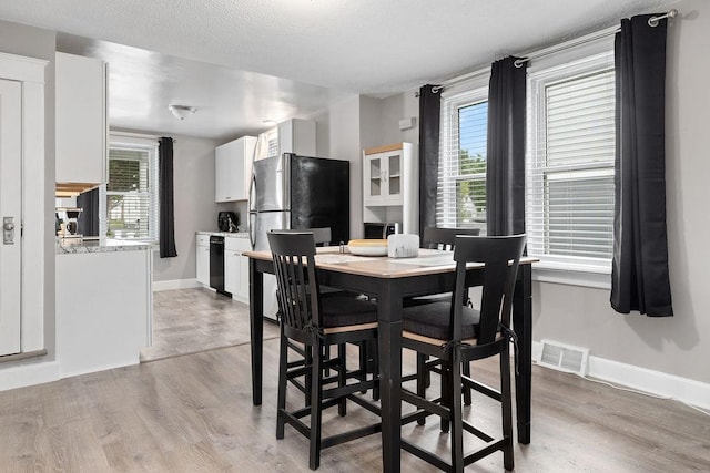 238 Charlotte Ave N, Waynesboro, VA 22980 - dining space featuring light wood finished floors and baseboards