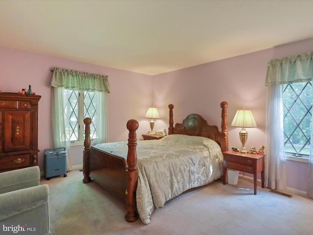  - bedroom with carpet flooring and baseboards