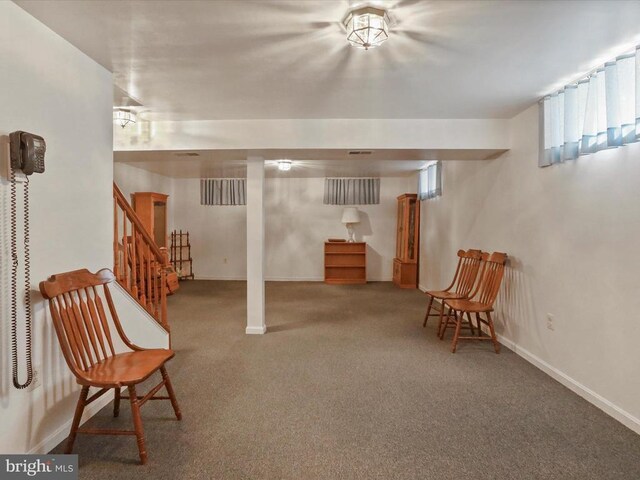  - finished basement with carpet flooring and stairs