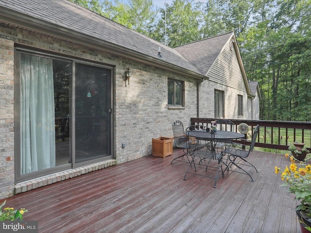  - wooden terrace with outdoor dining space