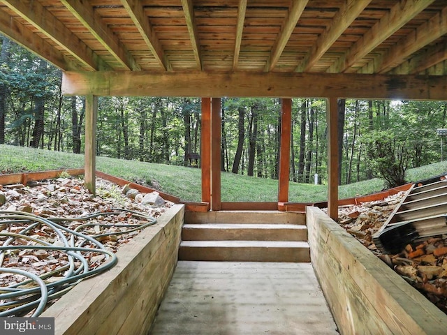  - view of patio / terrace with a forest view