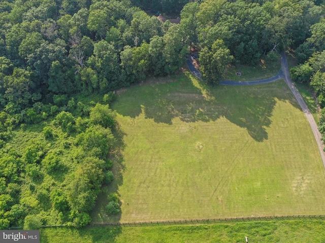  - drone / aerial view of a heavily wooded area
