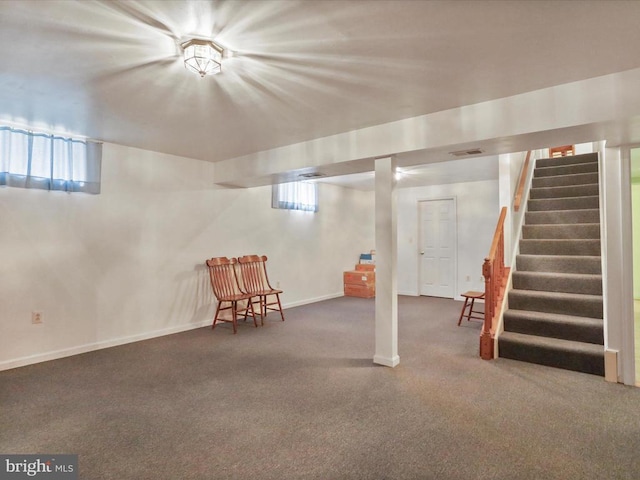  - below grade area featuring carpet floors and stairway