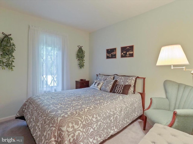  - carpeted bedroom featuring baseboards