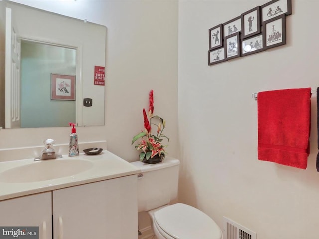 - bathroom with toilet and vanity
