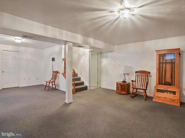  - finished below grade area featuring carpet and stairway