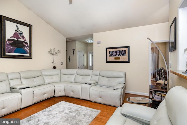 living room with wood finished floors