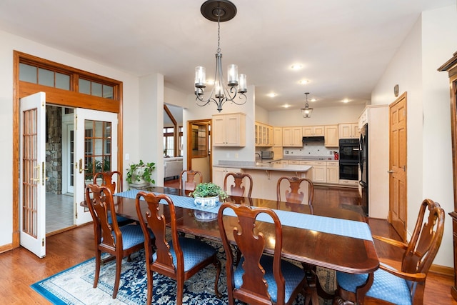 27 Black Walnut Ln, Nellysford, VA 22958 - dining area with a chandelier, dark wood finished floors, and french doors