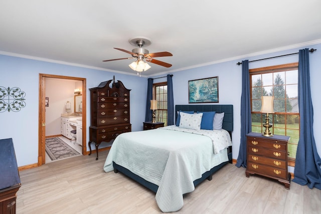 27 Black Walnut Ln, Nellysford, VA 22958 - bedroom featuring crown molding, light wood-type flooring, baseboards, ceiling fan, and connected bathroom
