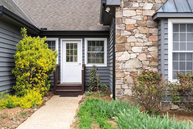 27 Black Walnut Ln, Nellysford, VA 22958 - property entrance featuring a shingled roof and stone siding