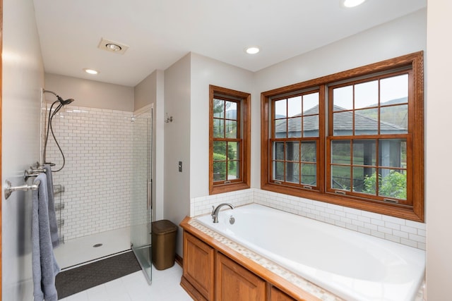 27 Black Walnut Ln, Nellysford, VA 22958 - bathroom featuring a stall shower, a garden tub, tile patterned flooring, and recessed lighting