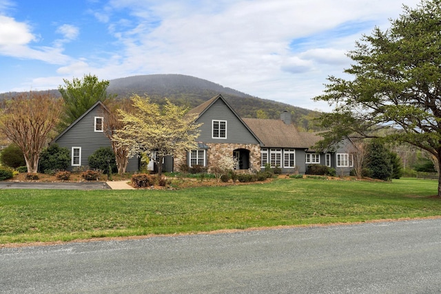 27 Black Walnut Ln, Nellysford, VA 22958 - view of front of property with a mountain view, a front lawn, and a chimney
