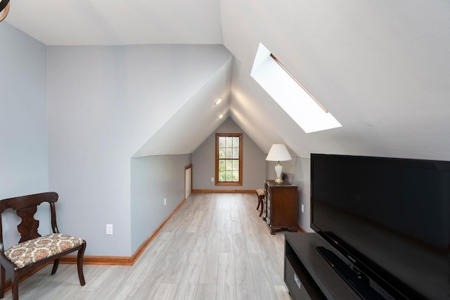 27 Black Walnut Ln, Nellysford, VA 22958 - additional living space featuring a skylight, lofted ceiling, light wood-style floors, and baseboards