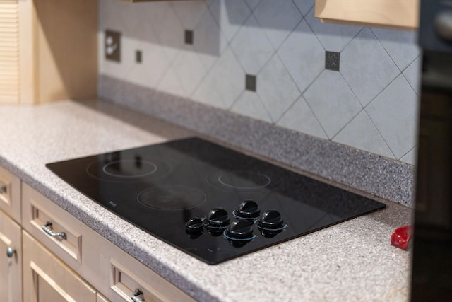 27 Black Walnut Ln, Nellysford, VA 22958 - kitchen view of black electric stovetop and light countertops