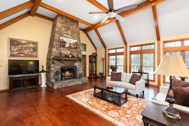 27 Black Walnut Ln, Nellysford, VA 22958 - living room with high vaulted ceiling, ceiling fan, a stone fireplace, beam ceiling, and wood finished floors