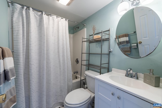 full bath featuring toilet, vanity, and shower / bathtub combination with curtain