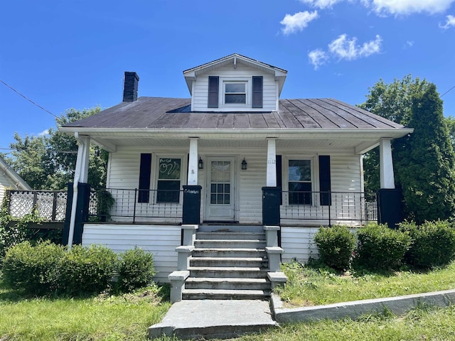 1112 Butler St, Staunton, VA 24401 - bungalow-style house featuring covered porch, a chimney, and a standing seam roof