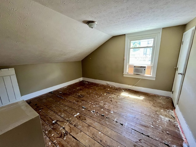 1112 Butler St, Staunton, VA 24401 - additional living space featuring a textured ceiling, wood-type flooring, lofted ceiling, cooling unit, and baseboards