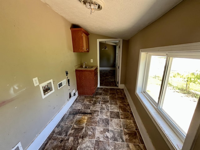 1112 Butler St, Staunton, VA 24401 - laundry room featuring cabinet space, electric dryer hookup, hookup for a washing machine, a textured ceiling, and baseboards