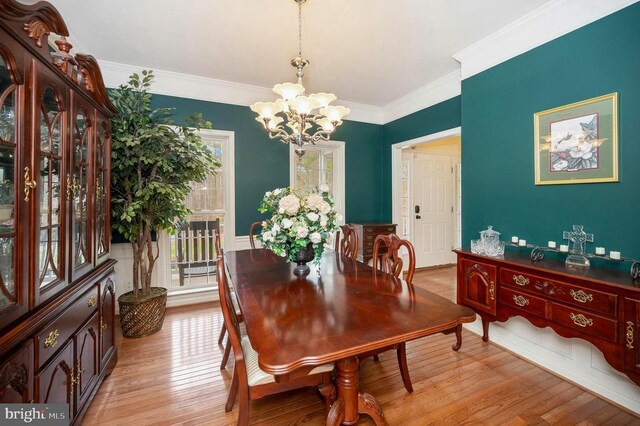 9920 Post Oak Rd, Spotsylvania, VA 22551 - dining space featuring a chandelier, light wood-type flooring, and ornamental molding