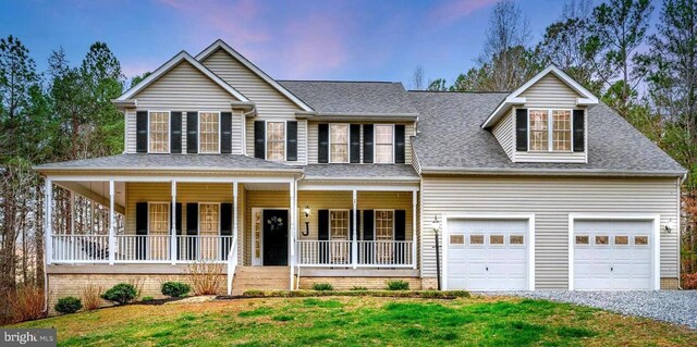 9920 Post Oak Rd, Spotsylvania, VA 22551 - view of front of home featuring covered porch, gravel driveway, a shingled roof, a garage, and a front yard