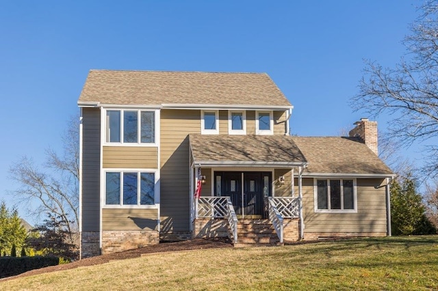 view of front of property featuring a porch and a front yard