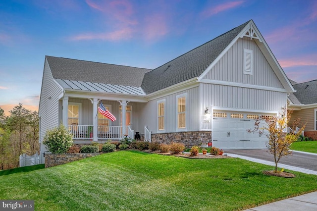 9822 White Oak Swamp Ct, Fredericksburg, VA 22407 - view of front facade with a porch, a standing seam roof, roof with shingles, a front yard, and board and batten siding