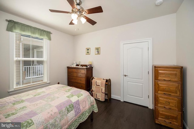 9822 White Oak Swamp Ct, Fredericksburg, VA 22407 - bedroom with dark wood-type flooring, baseboards, and ceiling fan