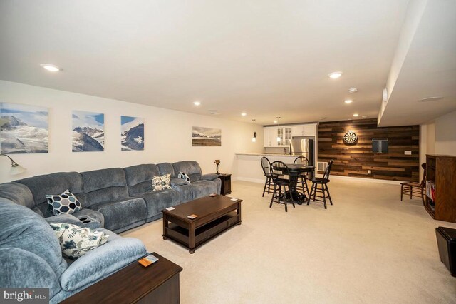 9822 White Oak Swamp Ct, Fredericksburg, VA 22407 - living area featuring wooden walls, light colored carpet, recessed lighting, and baseboards