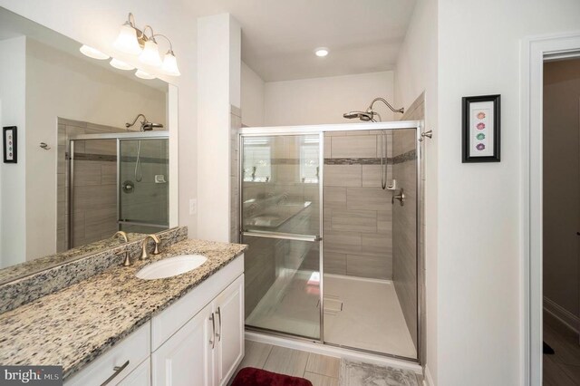 9822 White Oak Swamp Ct, Fredericksburg, VA 22407 - bathroom featuring a shower stall and vanity