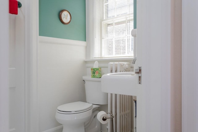 222 Grattan St E, Harrisonburg, VA 22801 - bathroom featuring toilet, wainscoting, and tile walls