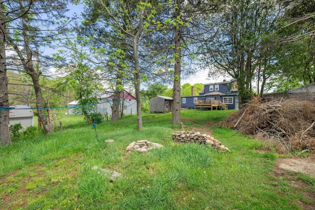 93 Eidson Creek Rd, Staunton, VA 24401 - view of yard with a shed, a deck, and an outbuilding