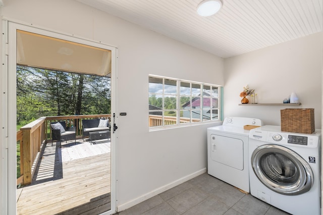 93 Eidson Creek Rd, Staunton, VA 24401 - clothes washing area with washing machine and dryer, baseboards, and tile patterned floors