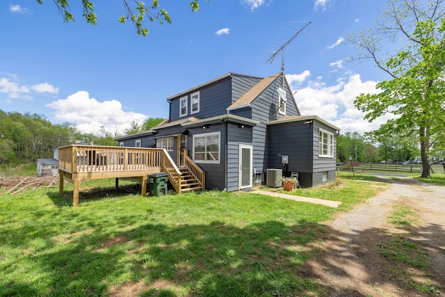 93 Eidson Creek Rd, Staunton, VA 24401 - rear view of house with central AC unit, a wooden deck, and roof with shingles