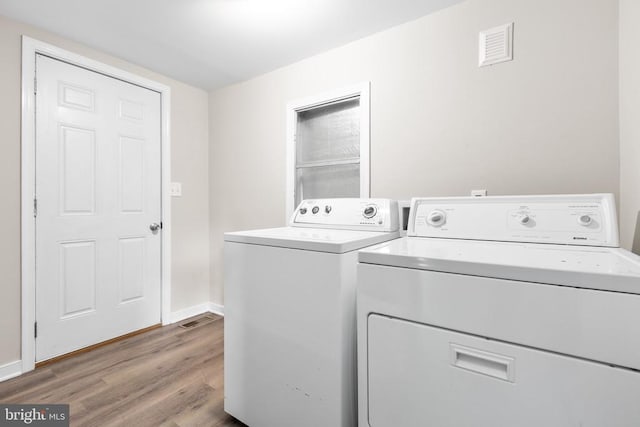 308 Virginia Ave, Mineral, VA 23117 - washroom featuring independent washer and dryer and wood finished floors