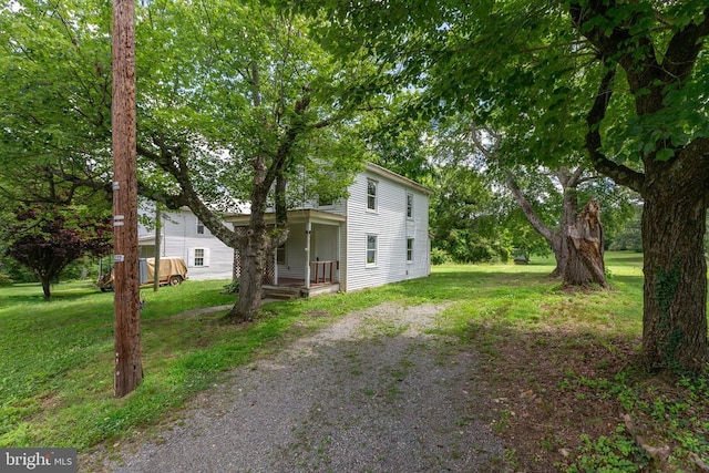 308 Virginia Ave, Mineral, VA 23117 - view of grassy yard with a porch