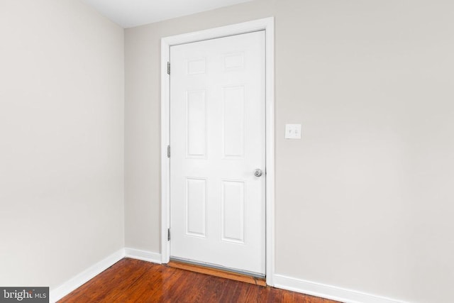 308 Virginia Ave, Mineral, VA 23117 - unfurnished room with baseboards and dark wood-type flooring