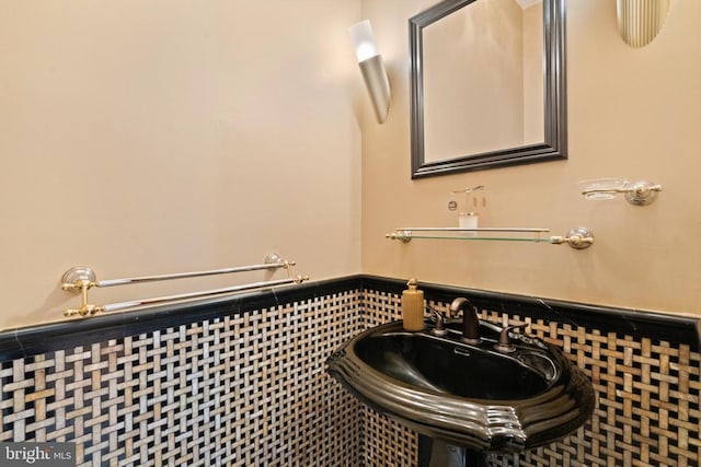 5442 Ellett Ln, Rixeyville, VA 22737 - bathroom featuring wainscoting, a sink, and tile walls