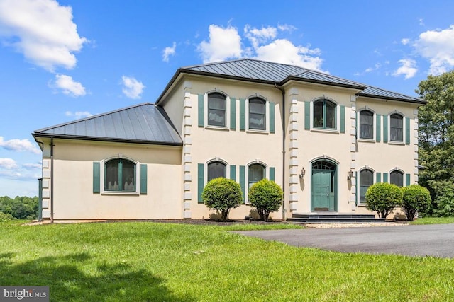 5442 Ellett Ln, Rixeyville, VA 22737 - view of front of property featuring a standing seam roof, metal roof, stucco siding, and a front yard